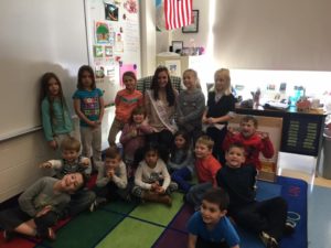 Miss Gate City’s Outstanding Teen, Julia Coryea reads Brown Bear Brown Bear to a group of students in Miss Mahoney’s class at Fisk Elementary School in Salem.